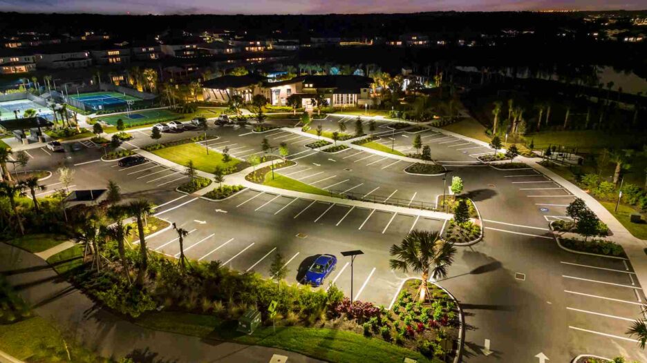 Fonroche solar streetlights illuminating a walkable outdoor mall in Florida enhance night-time retail visibility with hurricane-rated, grid-free design.