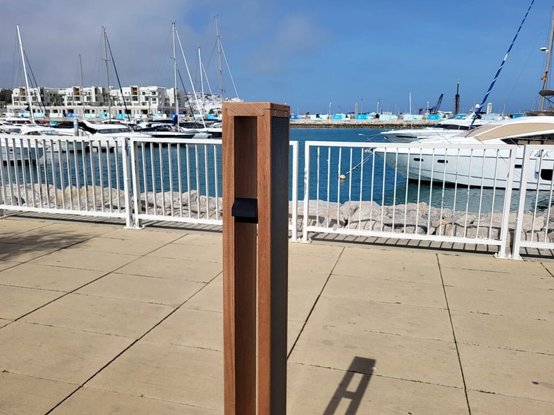 Solar landscape lighting at a Florida marina and coastal trail, enhancing safety without disrupting the environment