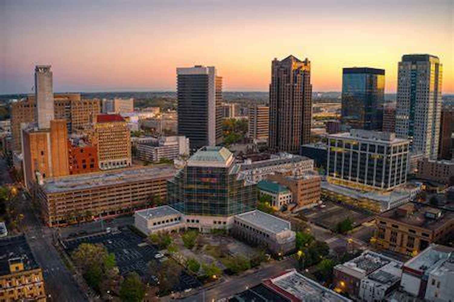 HDowntown Birmingham Alabama skyline at sunset with modern high-rise buildings and city landmarks