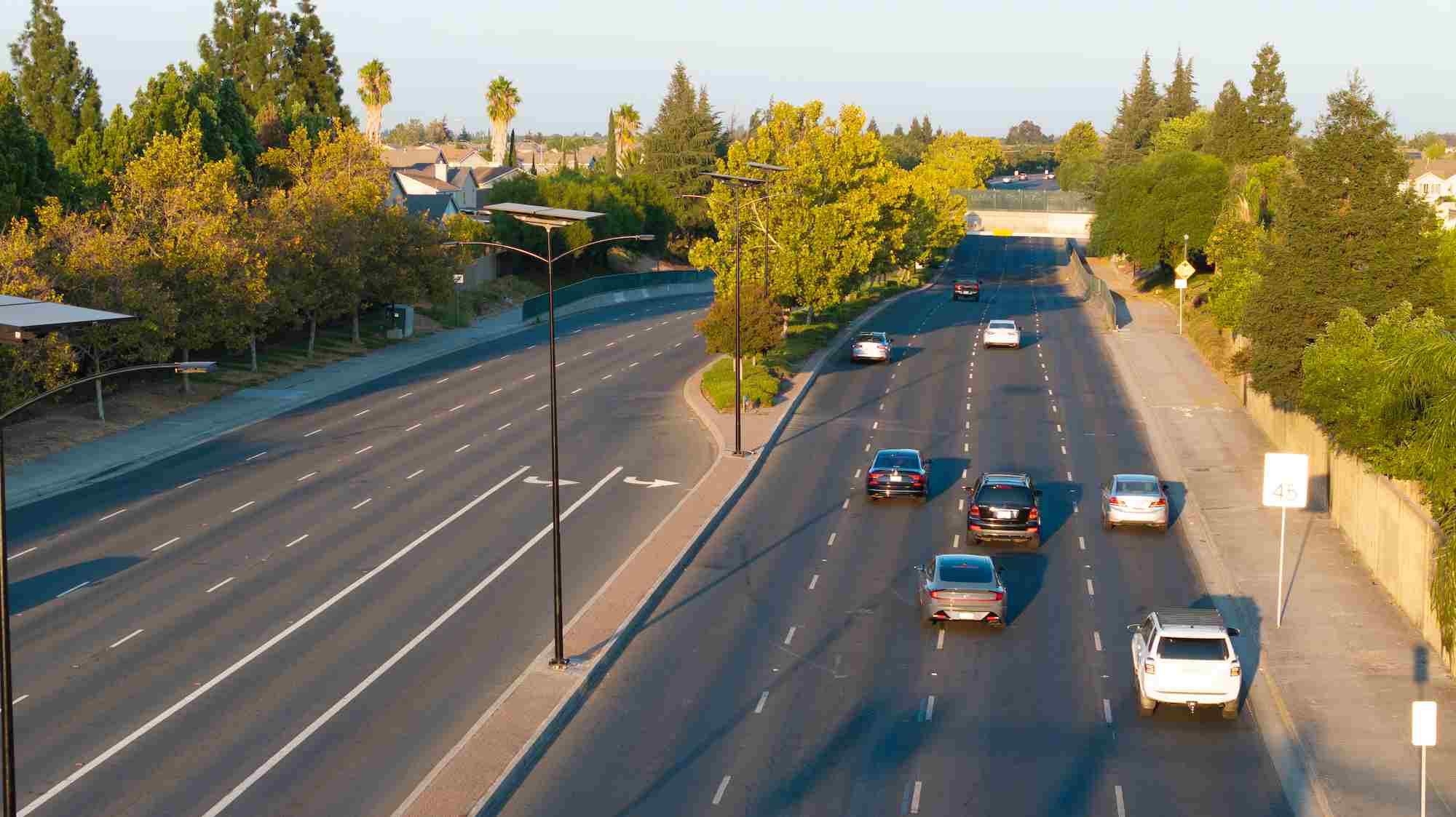 Solar streetlights installed along a busy California highway providing sustainable roadway lighting