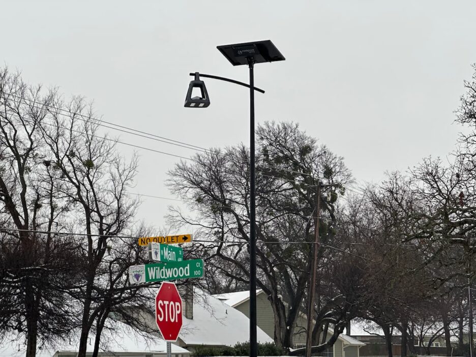 decorative solar street light in the snow in grapevine tx