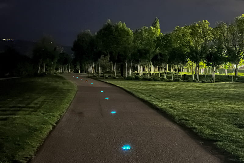 Nowatt Crystal Studs marking a public walkway with customizable, solar-powered lighting for both aesthetics and safety.