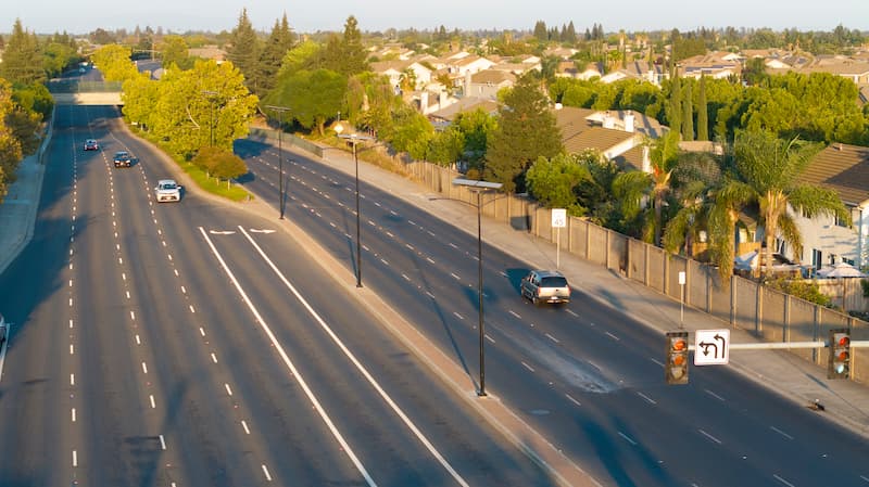 Solar street lighting improving visibility and safety on a highway.