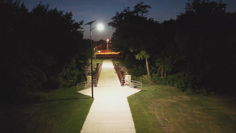 Fonroche SmartLight solar streetlight illuminating an urban greenway with sustainable, off-grid lighting