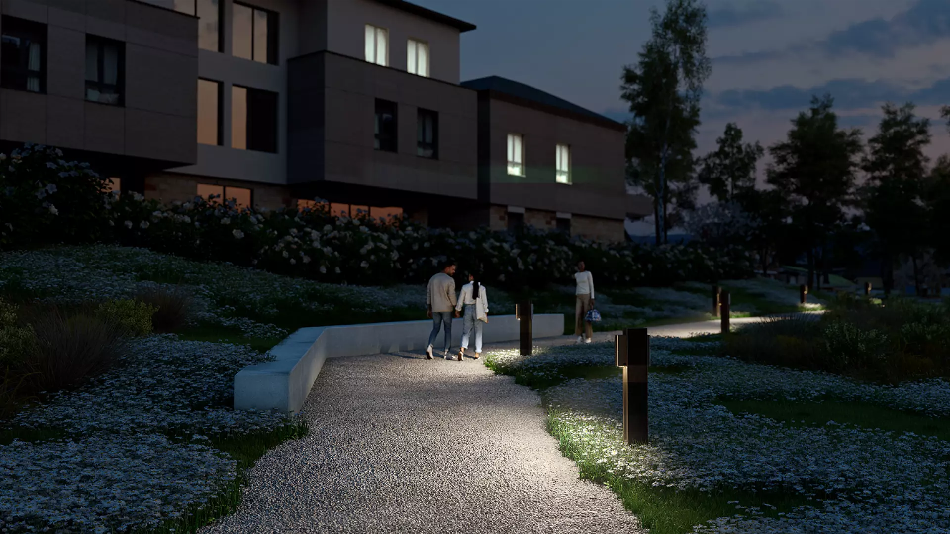 Solar bollard lights illuminating a residential pathway at night, enhancing safety and ambiance for pedestrians.